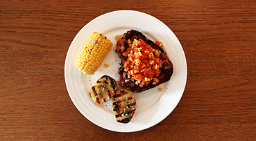 Svine T-Bone på grill med mango salsa og grill-kartoffel